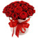 красные розы в шляпной коробке. Индонезия